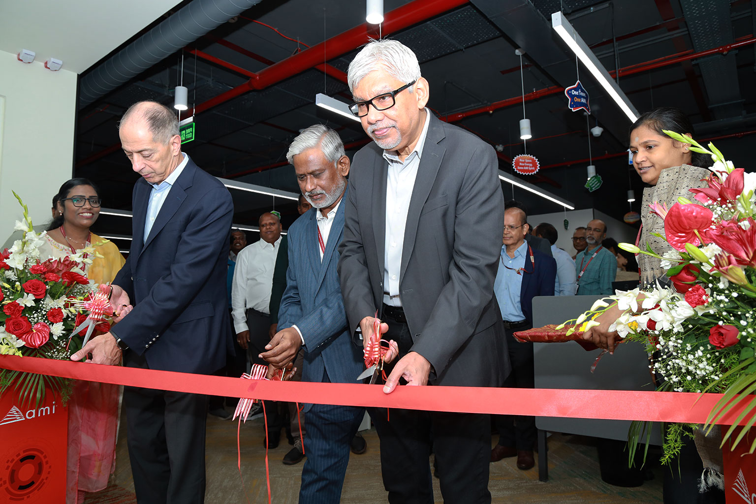 Close up of Sanjoy Maity, CEO of AMI cutting ribbon at new AMI office in Chennai